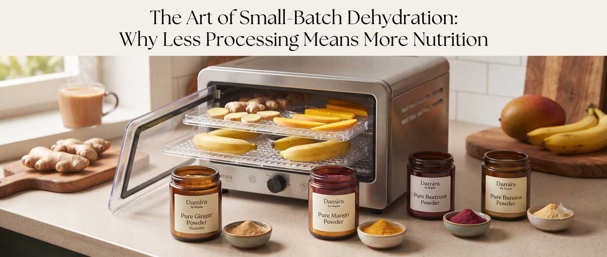 Stainless steel dehydrator and pure fruit powders by Damira by Gupta showing the small-batch production process