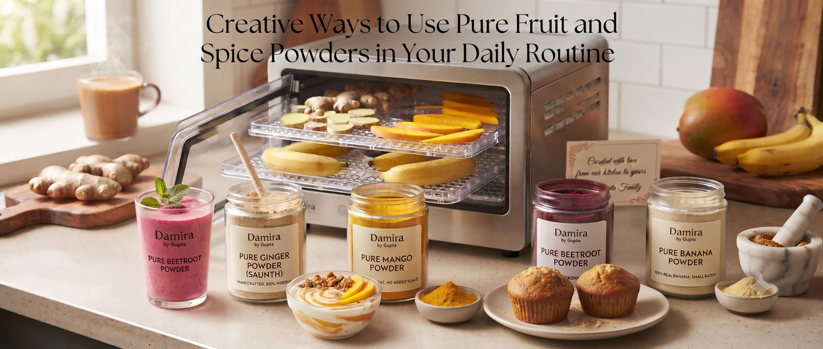 Four pure fruit and spice powders by Damira by Gupta — beetroot, ginger, banana, and mango — displayed on a kitchen counter