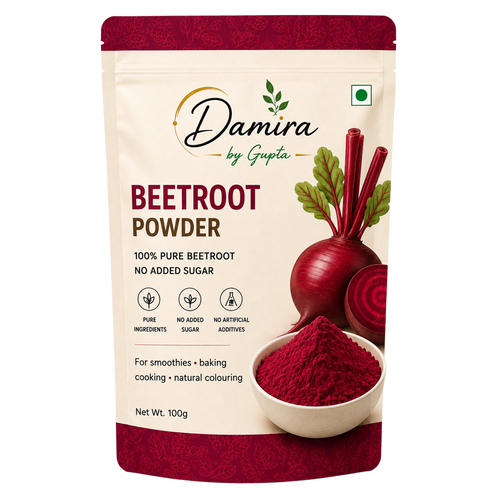 A 100g stand-up pouch of Damira by Gupta Beetroot Powder. The cream-colored packaging features a red top and bottom border, the brand logo, product name, and an illustration of a beetroot with a bowl of vibrant red powder.