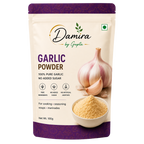 A 100g stand-up pouch of Damira by Gupta Garlic Powder, featuring a cream-colored background with purple accents, a graphic of a garlic bulb and clove, and a bowl of the yellowish powder.