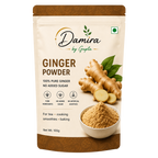 A 100g stand-up pouch of Damira by Gupta Ginger Powder, featuring a beige and brown design with an illustration of fresh ginger roots, green leaves, and a bowl of the ground ginger powder.