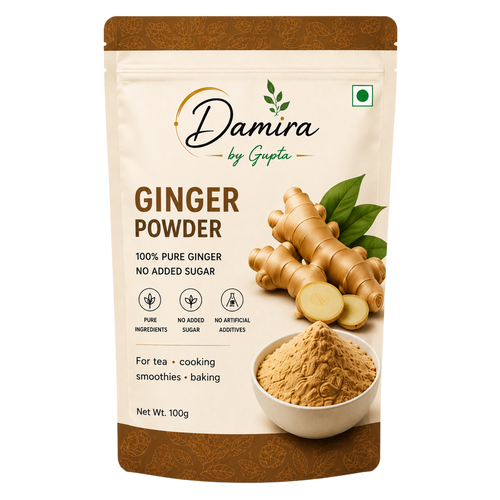 A 100g stand-up pouch of Damira by Gupta Ginger Powder, featuring a beige and brown design with an illustration of fresh ginger roots, green leaves, and a bowl of the ground ginger powder.